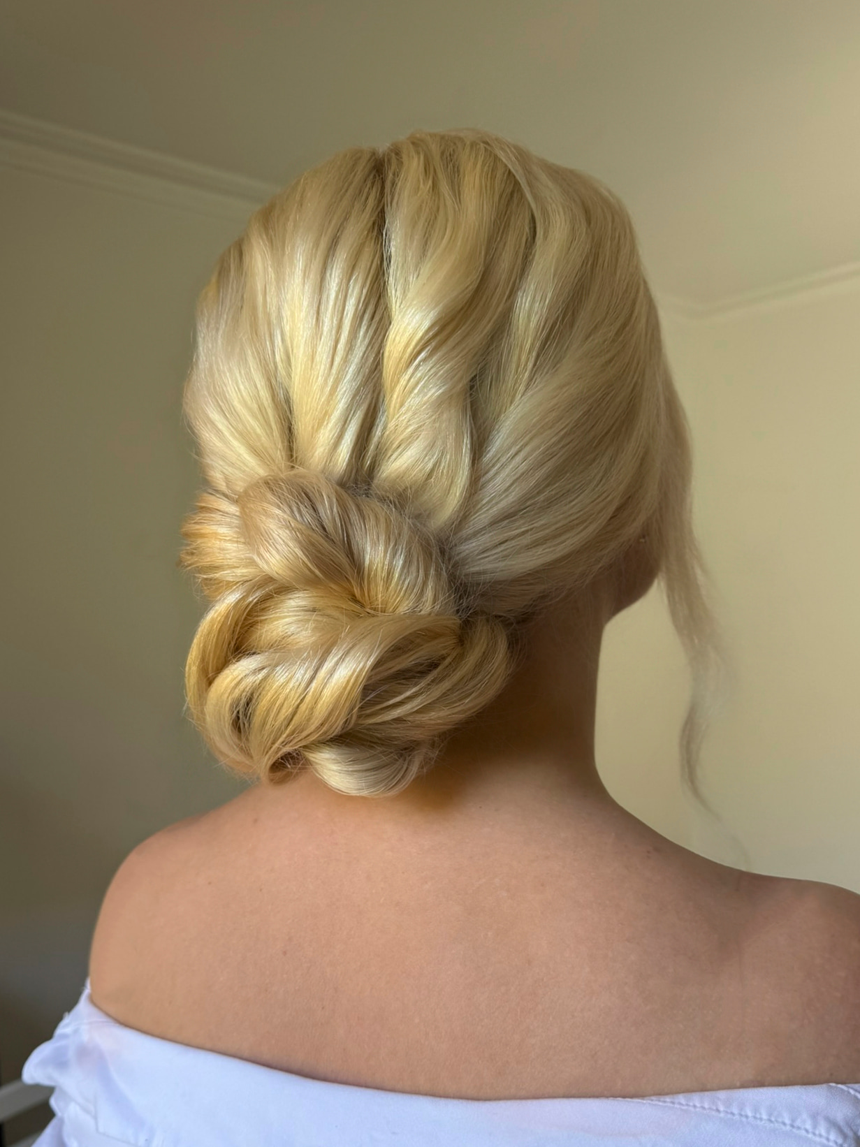 Soft blonde wrapped low bun bridal hair — Marikate Makeup Melbourne