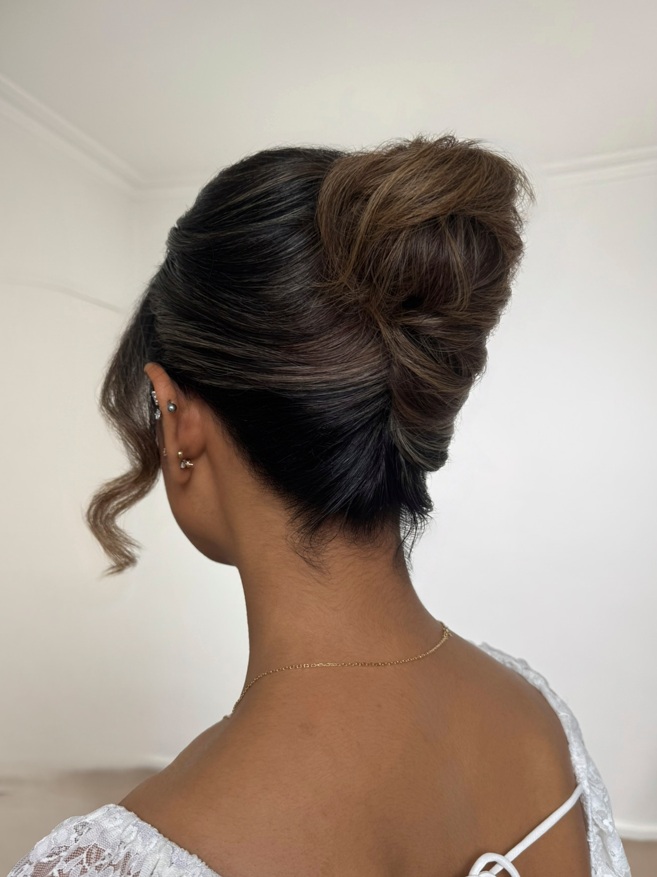Modern French twist upstyle with soft tendrils — Marikate Makeup Melbourne