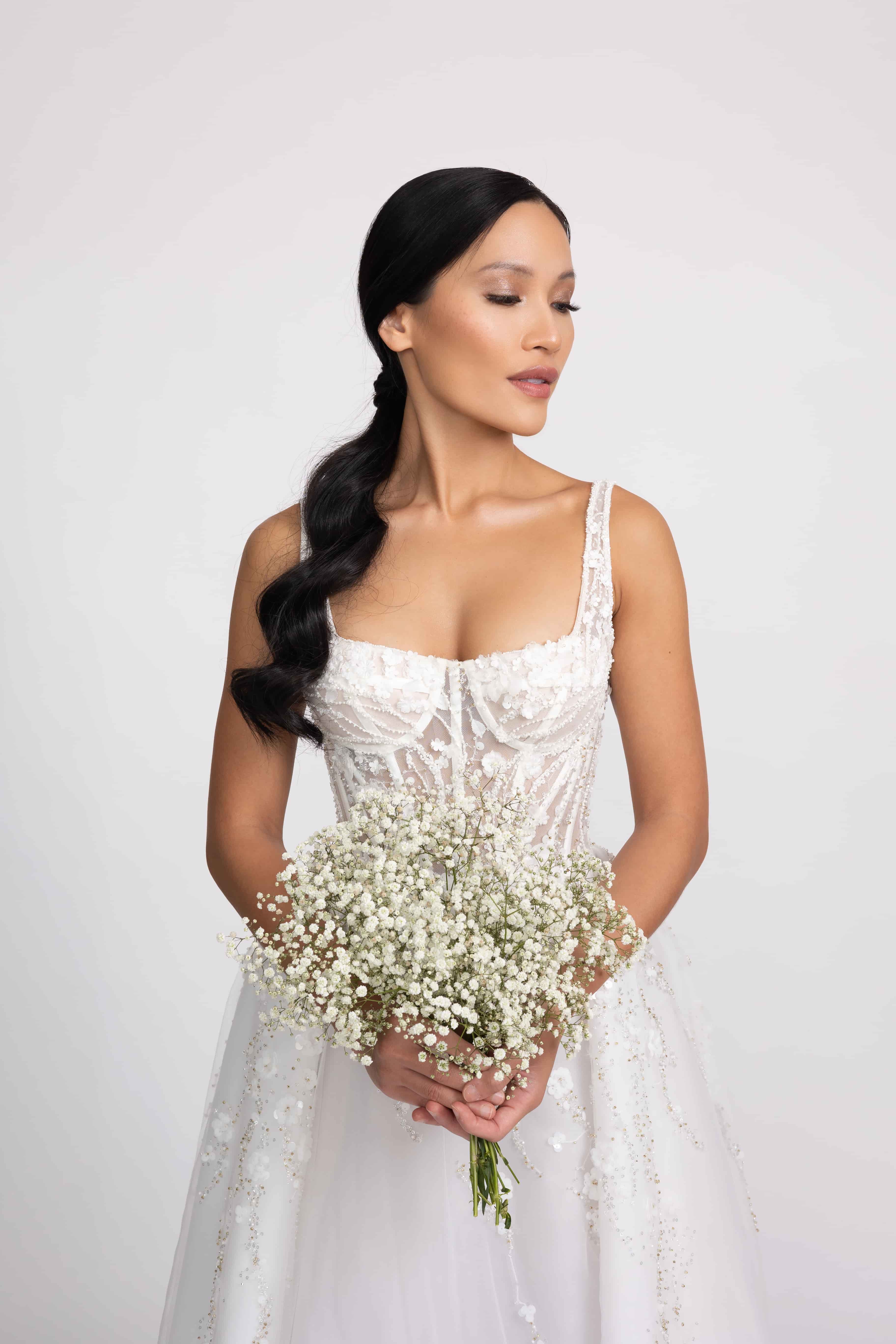 Bride with sleek side braid and baby’s breath bouquet — Marikate Makeup Melbourne