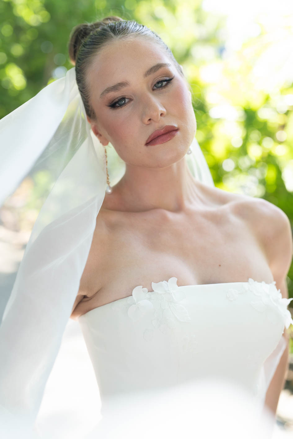 Bride with sleek high updo and veil — Marikate Makeup Melbourne