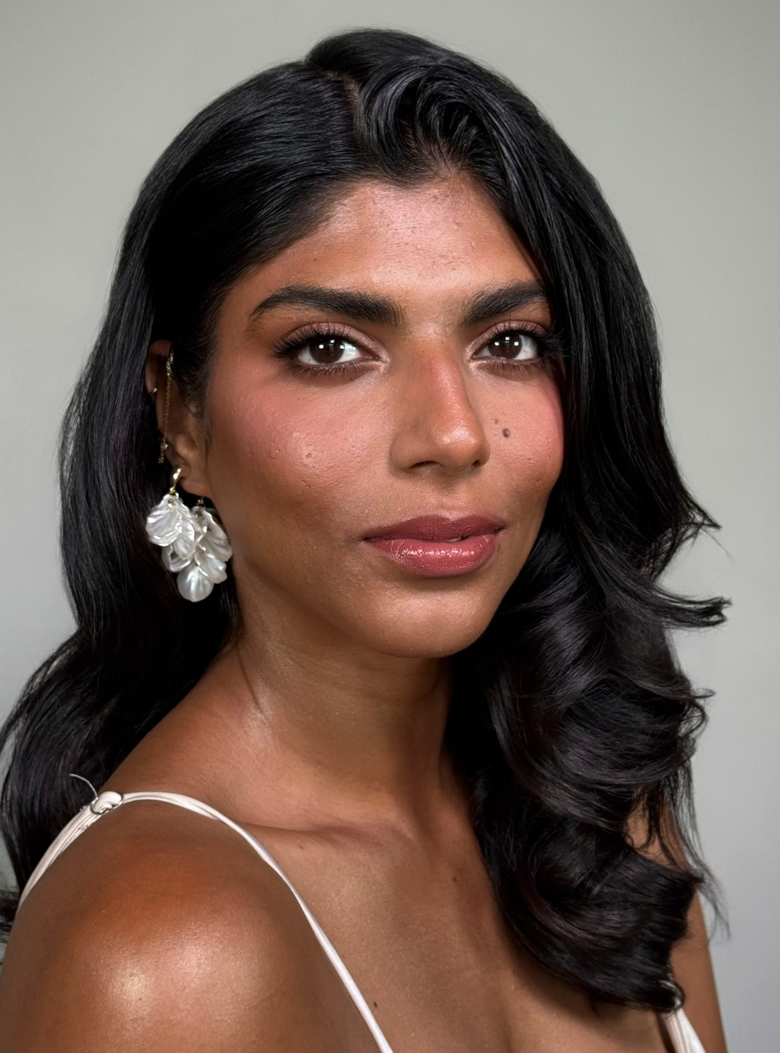 Glossy soft glam with waves and pearl earrings — Marikate Makeup Melbourne