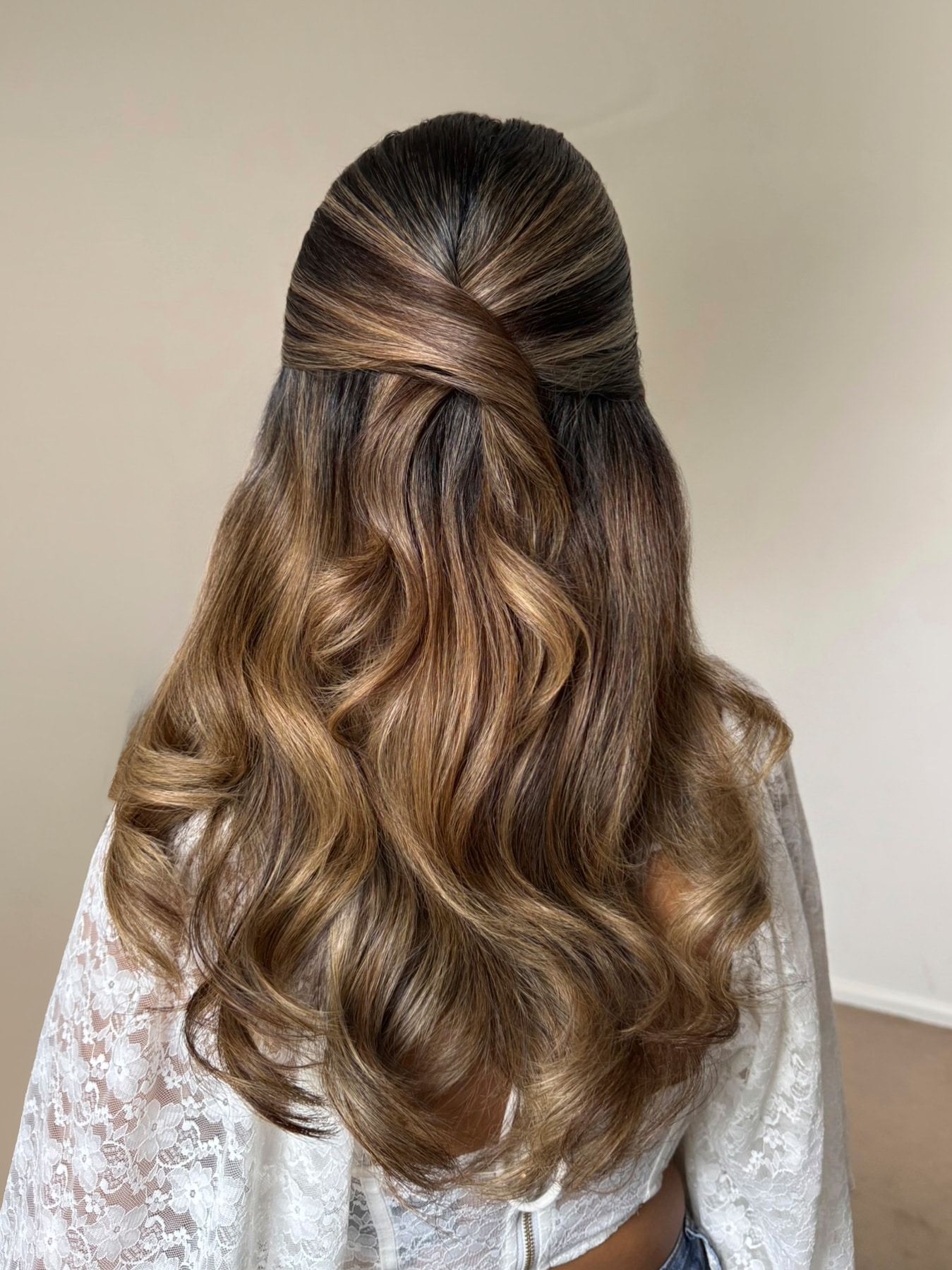 Half-up bridal style with soft waves and balayage — Marikate Makeup Melbourne
